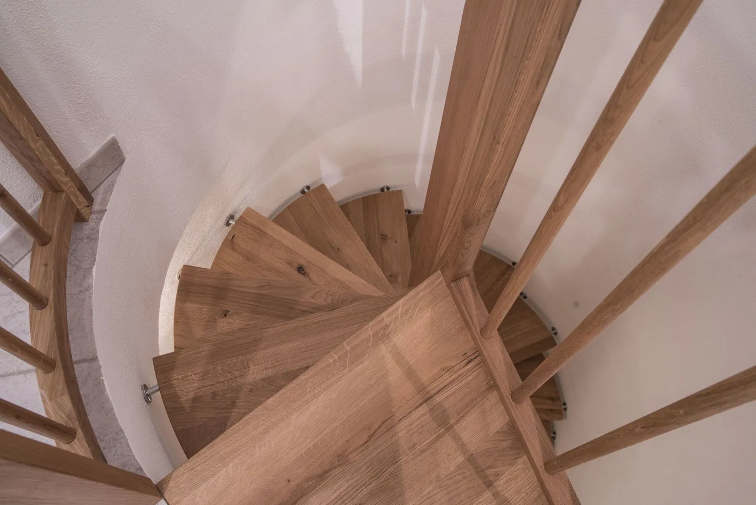 Rundtreppe in Massivholz